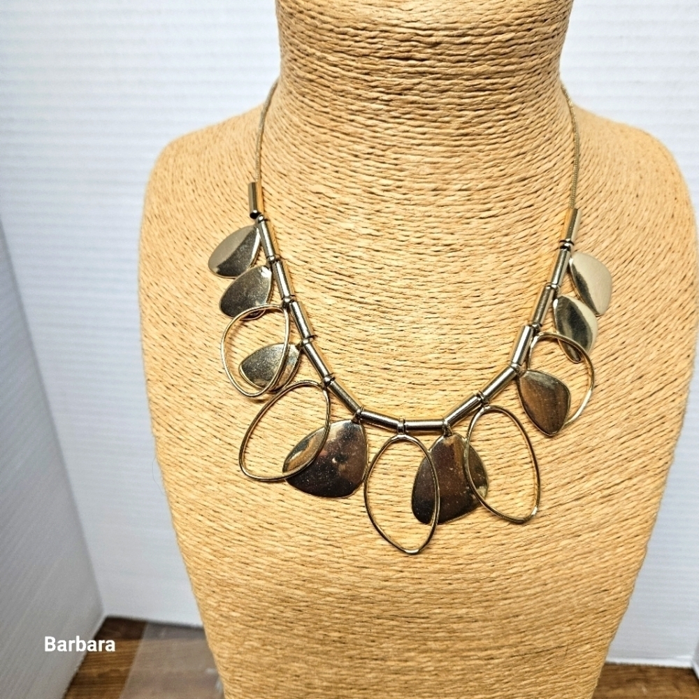 Gold-tone Alternating Outline and Solid Leaf-style Statement Necklace